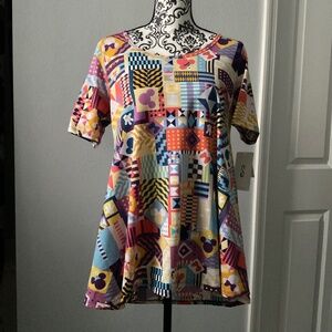 Pastel colorful Disney pattern shirt.